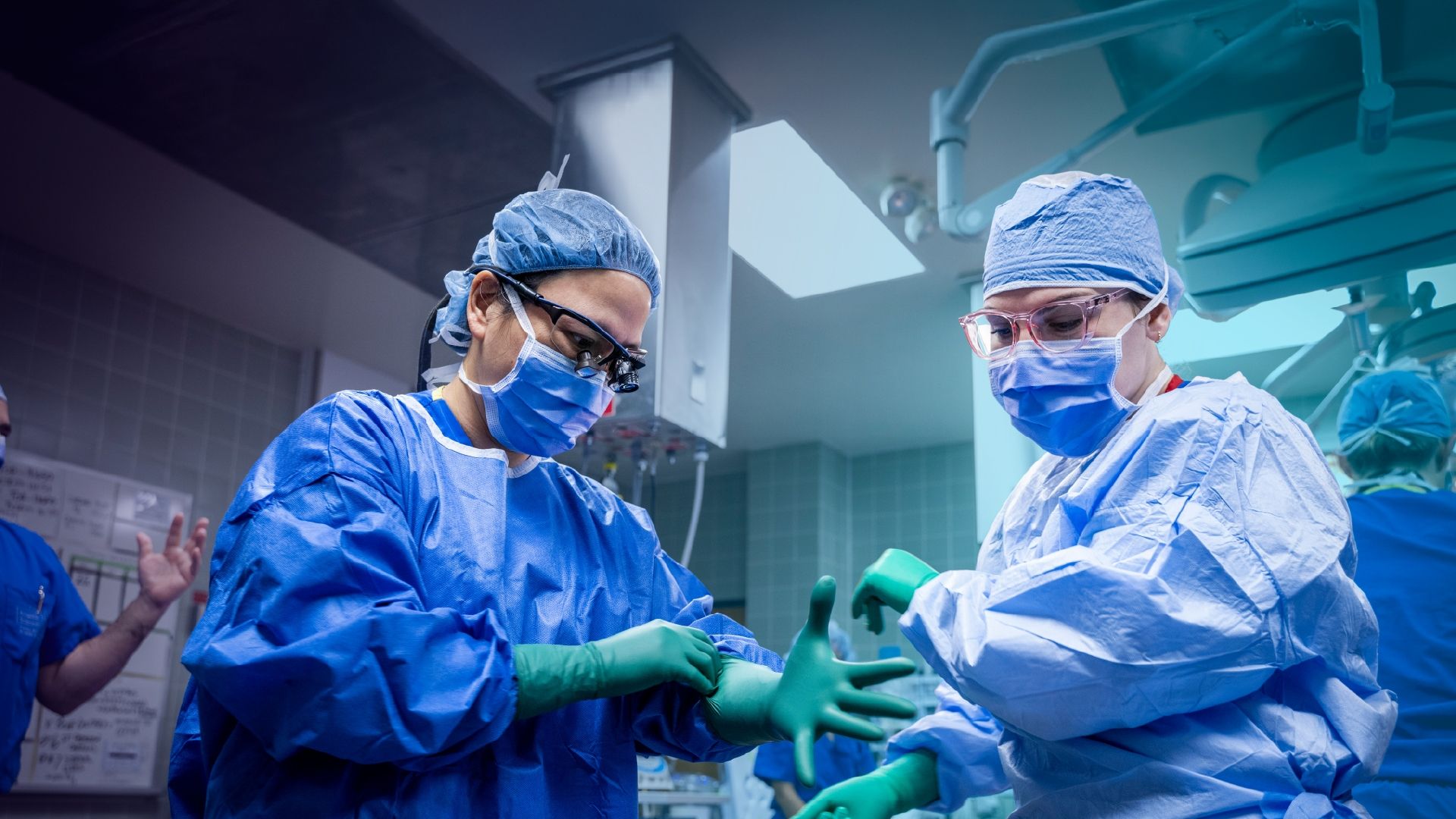 two surgeons preparing for cardiac procedure