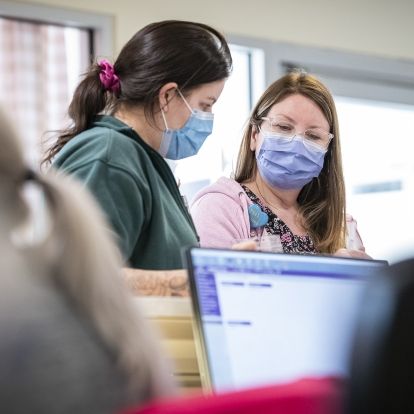 Nursing staff discuss patient care options in KHSC's Pediatric Critical Care Unit Nursing staff discuss patient care options in KHSC's Pediatric Critical Care Unit