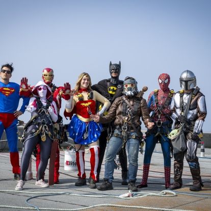 superhero window washers on the roof of KGH