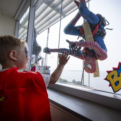 spiderman thrills young patient in hospital