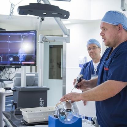 Dr. D.J. Cook, a neurosurgeon at KHSC demonstrates how the neuronavigation system works.
