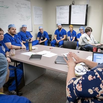 sterilization team huddle