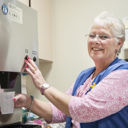 Volunteer Judy Torrents regularly delivers ice water to chemotherapy patients.
