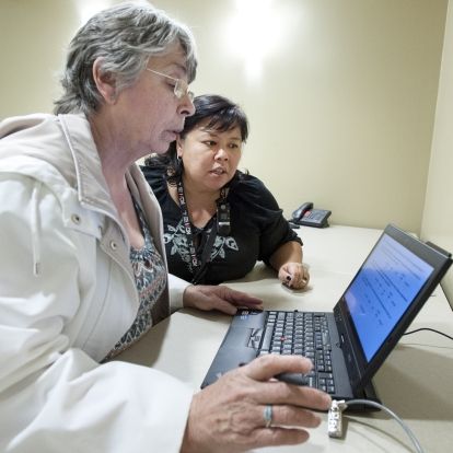 Nurse helping patient, follow up appointment, cancer care, evaluation