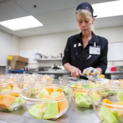 Food prep, staff preparing fresh fruit cups, KGH Nutrition Services