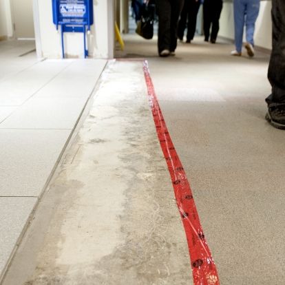 KGH markings for new carpet replacement on the floor