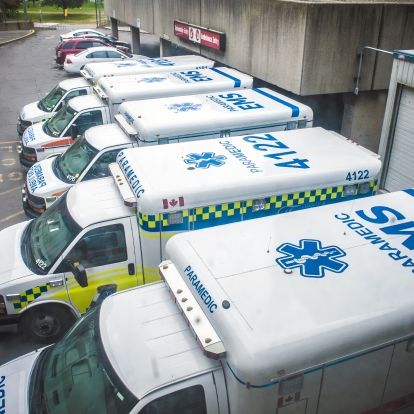 Ambulances parked at the offload ramp of KGH emergency department.