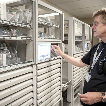 Registered Nurse Randy Powell uses one of two new cabinets in action on Kidd 4.