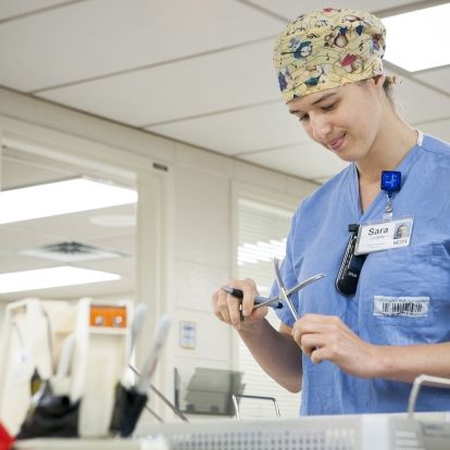 Sara Lavigne, Central Processing Technician, sports one of KGH's new ID clips. The clips are being handed out across the hospital to ensure people wear their ID at chest level.