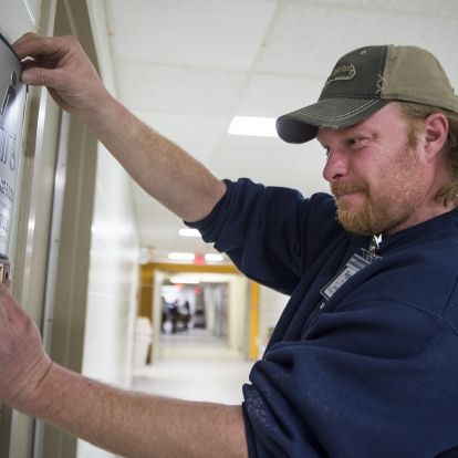 Pete Graf with WSI Sign Systems will be busy over the next week installing new wayfinding signs on levels 0 and 1.