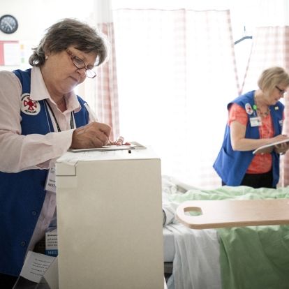 KGH employees filling in charts