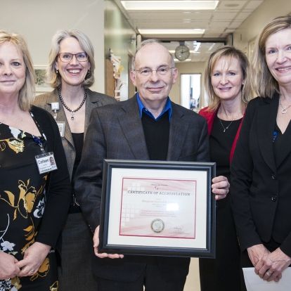 Assistant Deputy Minister Susan Fitzpatrick (right) from the Ministry of Health and Long-Term Care presented the Certificate of Accreditation to KGH. (From left) Colleen Londry, Chief  Sonographer, CEO Leslee Thompson, Dr. Anthony Sanfilippo and Julie Caffin, Program Operational Director, Cardiac and Emergency.