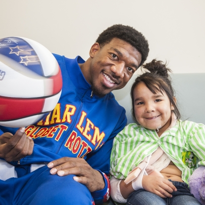 Harlem Globetrotter Anthony "Buckets" Blakes visited KGH's Pediatrics unit before a game at the K-Rock Centre