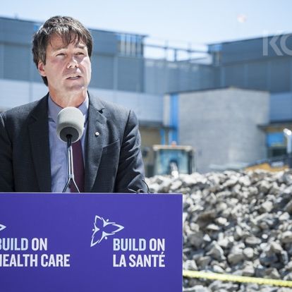 Minister of Health and Long-Term Care Dr. Eric Hoskins addresses guests and the media during the announcement.