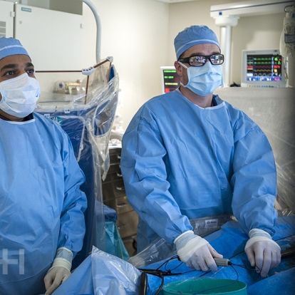 Dr. Ben Glover (R) uses KGH’s new Ensite Precision cardiac mapping system during a cardiac ablation procedure in our electrophysiology laboratory.