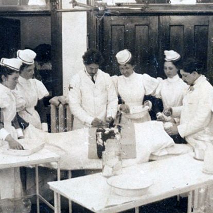 A mock scene of an operation in the Fenwick Operating Theatre. (c. 1896)