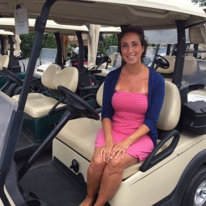 Breast cancer survivor Liz Adamson spoke to the golfers about her experience and how their support impacted her life