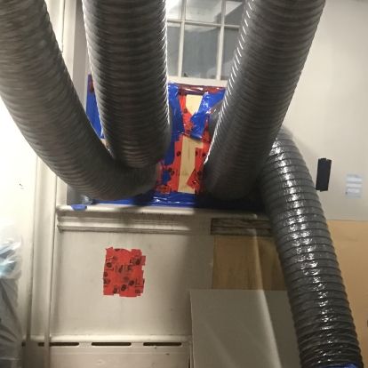 hoses ventilating air outside clinic