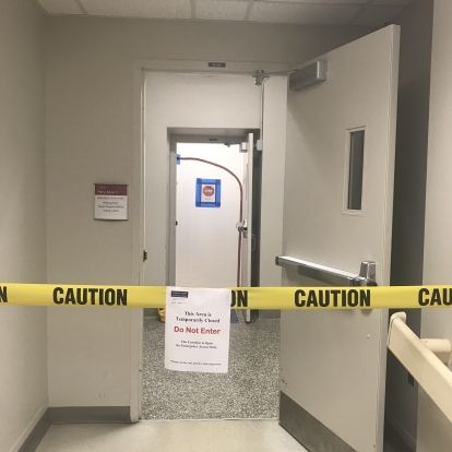 blocked-off clinic entrance