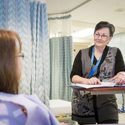 Arlene Funnell, coordinator with the Kidney Transplant Program at KHSC, meets with a live kidney donor
