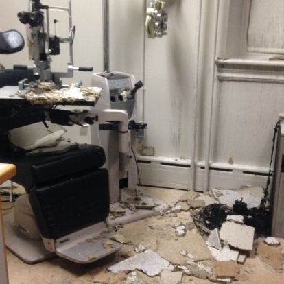 fire-damaged clinic exam room