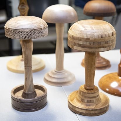 Members of the club volunteered their time to hand create the wig stands, spending around three hours per stand and crafting them over the past several weeks.