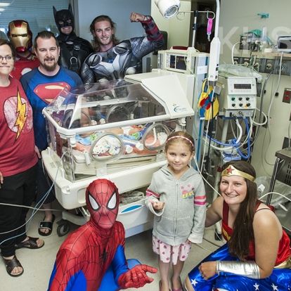 Superheroes from Elite Window Cleaning bring smiles to our youngest patients at our KGH site.