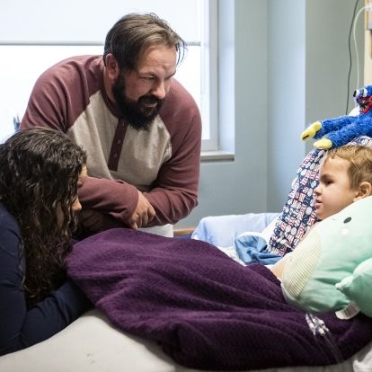 Stephanie, Adam and Remy Rutherford in their room on the Kidd 10 Pediatrics Unit at KHSC