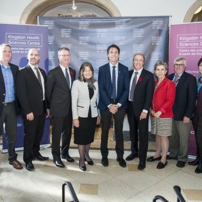 Minister of Health and Long-Term Care Dr. Eric Hoskins, MPP Sophie Kiwala and KHSC President and CEO Dr. David Pichora, pose with honourded guests following the event.