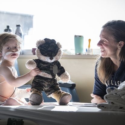 Child with teddy bear