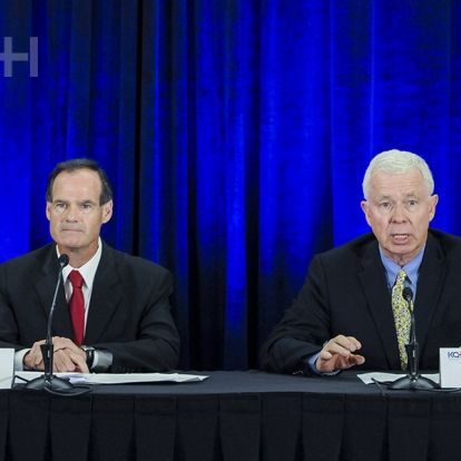 Hotel Dieu Board Chair Michael Hickey (L) and KGH Board Chair George Thomson (R) speak to the media during the announcement press conference