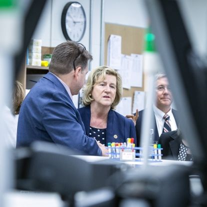 Chief Information Officer Troy Jones tours Minister Jaczek through our Clinical Laboratory