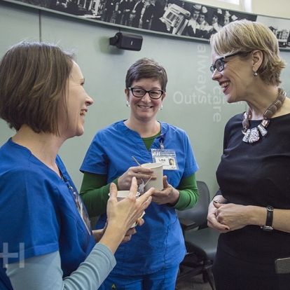 Leslee Thompson chats with staff during a brief farewell event at KGH.
