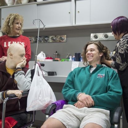 Getting hair prepped for the fateful cut
