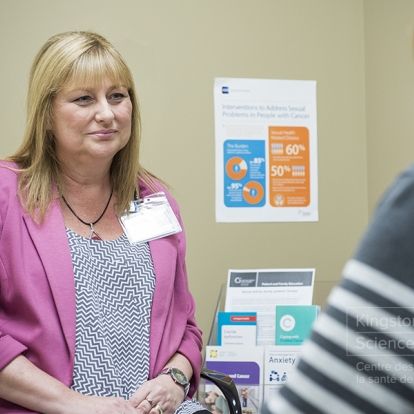 Janet Giroux, Nurse Practitioner and co-lead of the clinic, meets with patients twice a month