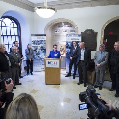 Executive Director of the UHKF Denise Cummings speaks to KCCU representatives and members of the media