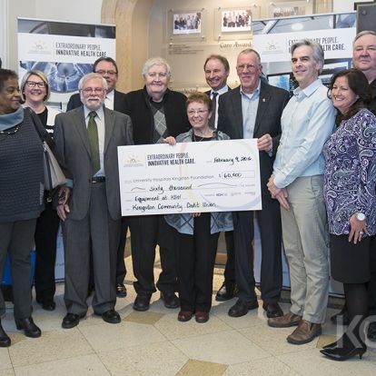 Members of the KCCU, UHKF and KGH Laboratory Services Department during the cheque presentation