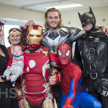 Superheroes from Elite Window Cleaning bring smiles to our youngest patients at our KGH site.