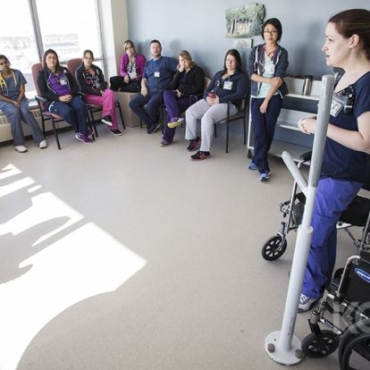 Physiotherapist Elizabeth Brown educating staff on Connell 10 about the new transfer poles.