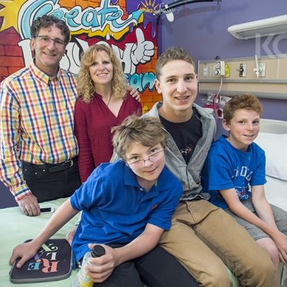 Donor family from Kingston in one of the renovated inpatient rooms at KGH.