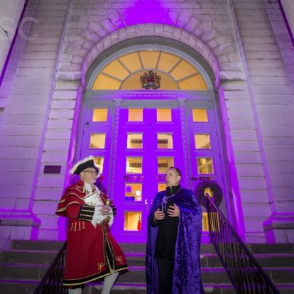 Dr. Robert Connelly, Program Medical Director of Pediatrics at Kingston Health Sciences Centre address the crowd gathered at City Hall.