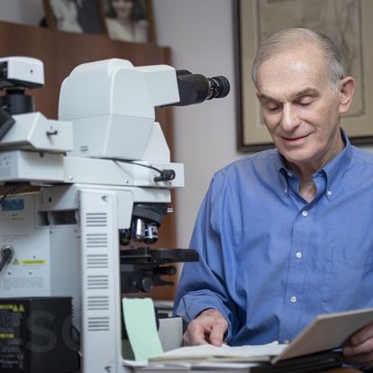 Pathologist Dr. Paul Manley is being recognized for his 45 years of service with KHSC