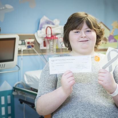 Former patient Carly sold candy in support of KHSC pediatric oncology patients