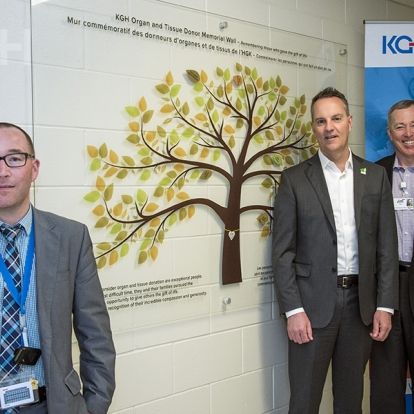(L to R) Critical Care Physician Dr. Gordon Boyd, Michael Ward from the Trillium Gift of Life Network and KGH Interim CEO Jim Flett stand in front of the new donor wall.