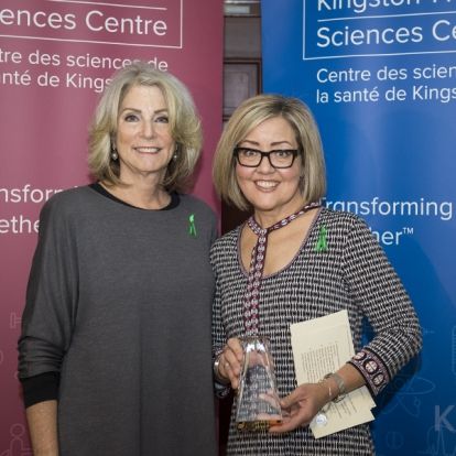 Trillium Gift of Life Network CEO Ronnie Gervais (L) presents the inaugural 'Advocates in Action' award to Shillane Labbett (R)