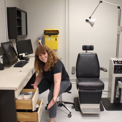 clinic staff restocking clinic space