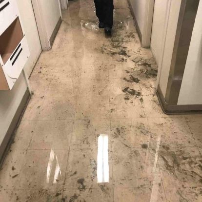 watersoaked hallway in clinic