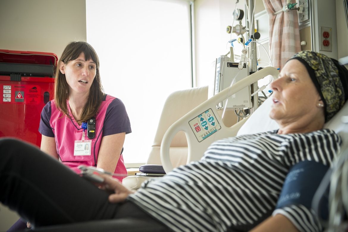 Apheresis lead nurse Julie Williams A KHSC nurse speaking with a patient