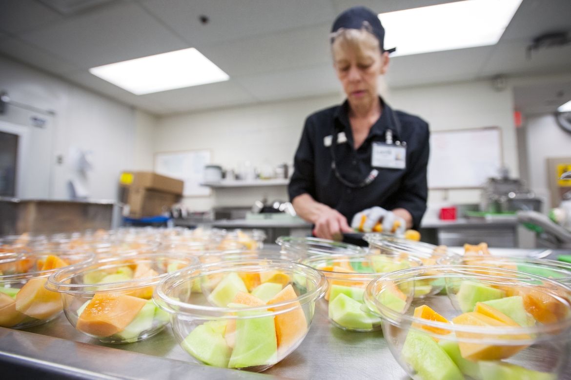 Food prep, staff preparing fresh fruit cups, KGH Nutrition Services