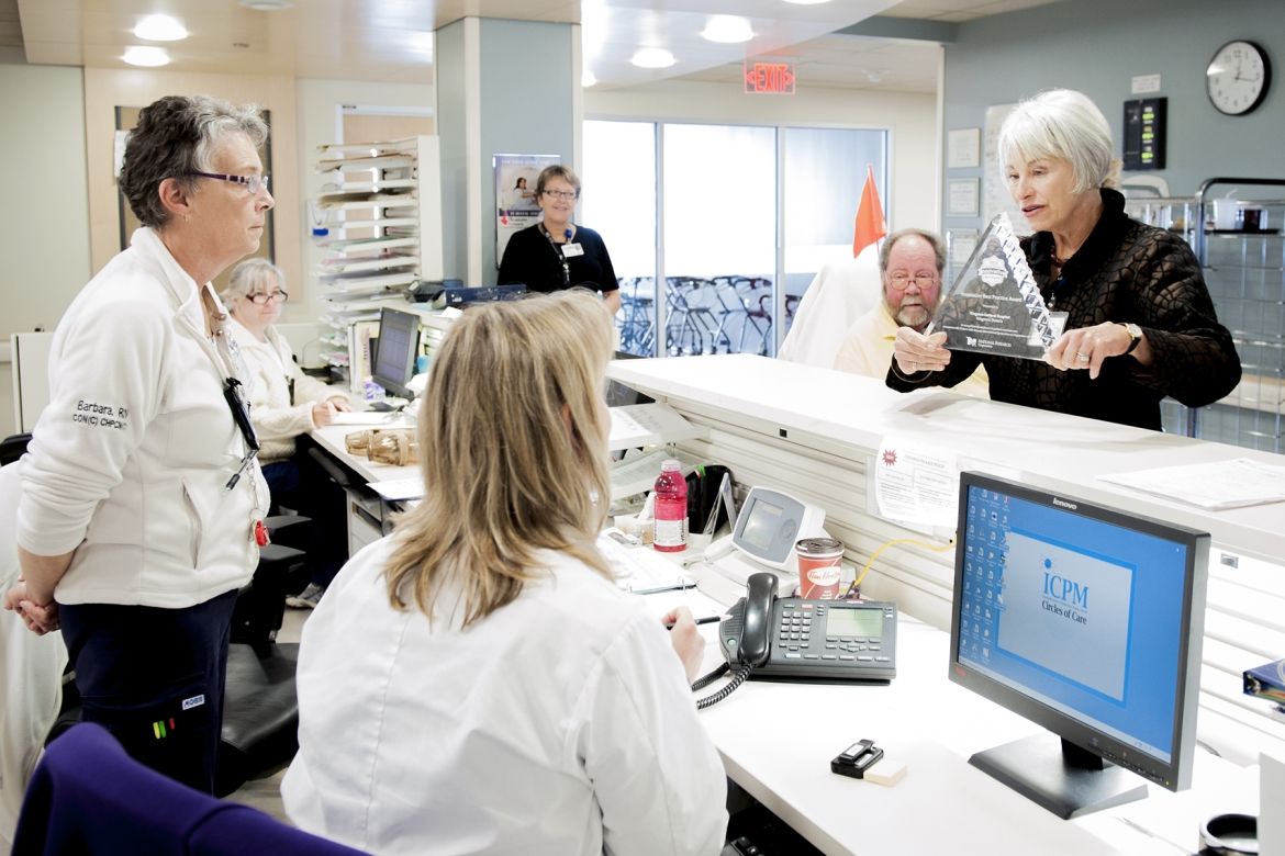 Patient Experience Advisors Anndale McTavish and Glenn Outhwaite will be part of this week's celebration. They are seen here taking our NRC Picker Innovative Best Practice Award 2012 on a tour of the hospital to share it with front-line staff.